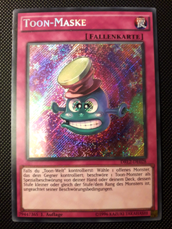 Yu-Gi-Oh! Toon-Maske, DRL2-DE028, Secret Rare, 1. Auflage, Deutsch, Excellent - Image 1