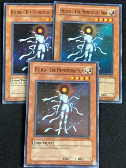 YUGIOH HELIOS THE PRIMORIAL SUN WC6-EN002 SUPER X3 PLAY/EDGE WEAR - Image 1