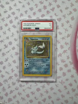 1999 Pokemon Jungle Vaporeon Holo 12/64 Graded PSA 5 - Image 1