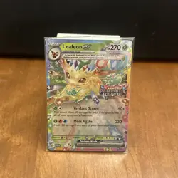 Prismatic Evolutions Surprise Box Stamped Promo Card Leafeon EX 006/131 Sealed - Image 1