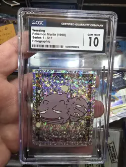 CGC 10 GEM MINT 1999 MERLIN POKEMON S17 WEEZING-PRISM - Image 1