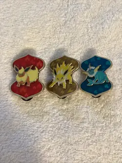 Lot of 3 VMAX Official Pokemon TCG Enamel Pins-Flareon, Vaporeon, Jolteon - Image 1