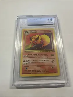 1999 POKEMON FLAREON NON-HOLO JUNGLE UNLIMITED 19/64 CGC 8.5 Card - Image 1
