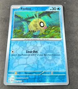 Pokemon Surging Sparks Feebas Reverse Holo Common Card 041/191 NM - Image 1