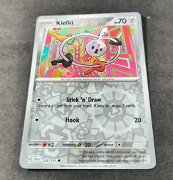 Pokemon Surging Sparks Klefki Reverse Holo Common Card 128/191 NM - Image 1