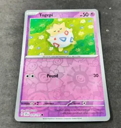 Pokemon Surging Sparks Togepi Reverse Holo Common Card 070/191 NM - Image 1