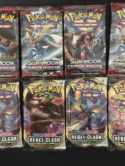 Lot of Pokemon Sun & Moon Crimson Invasion and Sword & Shield Rebel Clash Packs - Image 1