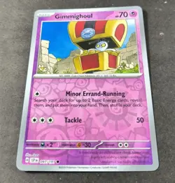 Pokemon Surging Sparks Gimmighoul Reverse Holo Common Card 097/191 NM - Image 1