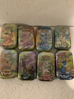 POKEMON TCG S & V 8.5 PRISMATIC EVOLUTIONS MINI TIN SET (8) FACTORY SEALED - Image 1