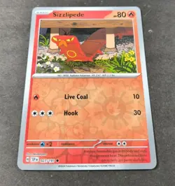 Pokemon Surging Sparks Sizzlipede Reverse Holo Common Card 027/191 NM - Image 1