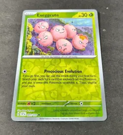Pokemon Surging Sparks Exeggcute Reverse Holo Common Card 001/191 NM - Image 1