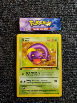Pokemon TCG Ekans Fossil 46/62 1st Edition Wizards Base Set NM+ - Image 1