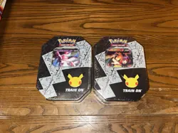 Pokemon 25th Anniversary Celebrations Tin Set: Lance's Charizard & Dark Sylveon - Image 2