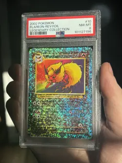 2002 POKEMON LEGENDARY COLLECTION #10/110 FLAREON REVERSE HOLO PSA 8 - Image 1