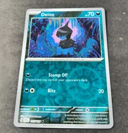 Pokemon Surging Sparks Deino Reverse Holo Common Card 117/191 NM - Image 1