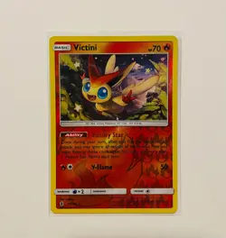 Victini 10/145 - Sun & Moon Guardians Rising - Reverse Holo Pokemon Card NM - Image 1