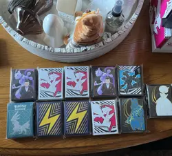 Pokemon TCG Assorted ETB Card Sleeves Lot Of 11 Sealed - Image 1