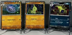 Pokemon Triple Whammy Tin Cosmos Holo Promo Cards - All 3 (Tyranitar evo line) - Image 1