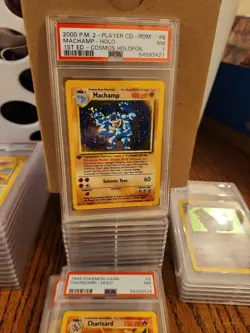 2000 POKEMON 2-PLAYER CD-ROM STARTER SET 1ST ED COSMOS FOIL MACHAMP-HOLO PSA 7 - Image 1