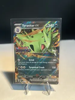 Pokemon TCG Tyranitar EX Cosmos Holo Prismatic Evolutions 64/131 Set Stamp - Image 1