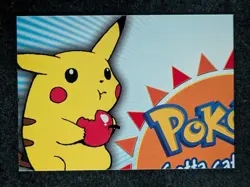 2000 Topps Pokemon TV Animation Series 2 PIKACHU HOLDING APPLE Puzzle Piece #1 - Image 1