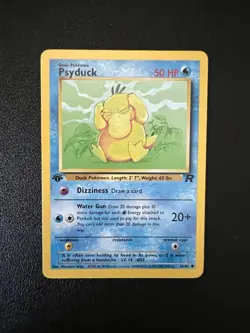 ?? 1st Edition Stamp Psyduck Non Holo WOTC Pokemon Card 65/82 Rocket Set 1999 NM - Image 1