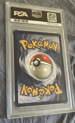 1999 Pokemon Fossil Dragonite Holo Rare Card 4/62 PSA 7 - Image 2