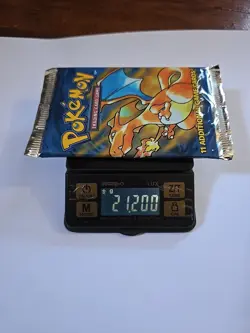 Heavy Base Set WOTC Pokemon Sealed Booster Pack Charizard Art 21.2 - Image 1