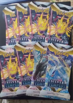 Sleeved Pokemon Silver Tempest Booster Packs Qty 8 Factory Sealed - Image 1