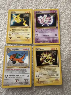 1999 Pokemon First Movie Set x4 LP WB Black Star Promo Cards - Image 1