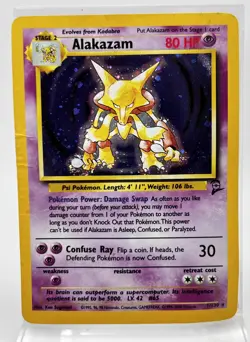 Alakazam 1/130 Holo Base Set 2 Pokemon Card 1999 HP/DMG - Image 1