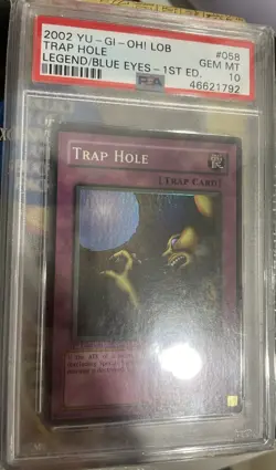 Yugioh PSA 10 WAVY Trap Hole LOB-058 Super Rare 1st Edition - Image 1