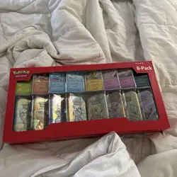 Pokemon Prismatic Evolutions Costco 8 Mini-Tin Bundle w/Promo SEALED - Image 1