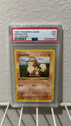 1999 Pokemon Base Set 1st Edition Growlithe Card #28 PSA 7 - Image 1