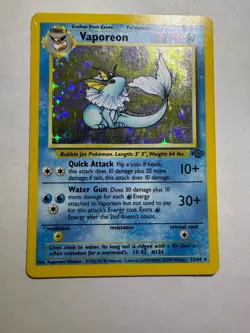 Vaporeon 12/64 Pokemon Card Holographic Base Set Rare 1999 Wizards of the Coast - Image 1