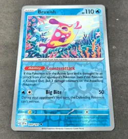 Pokemon Surging Sparks Bruxish Reverse Holo Uncommon Card 049/191 NM - Image 1