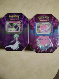 POKEMON BLISSEY & GARDEVOIR TINS: 3 packs per tin, 10 cards per pack, + promos - Image 1