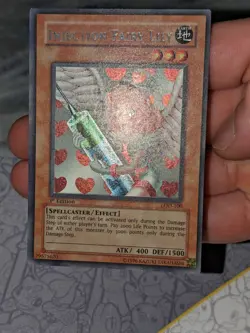 Yu-Gi-Oh! TCG Injection Fairy Lily Legacy of Darkness LOD-100 1st Edition Secret - Image 1