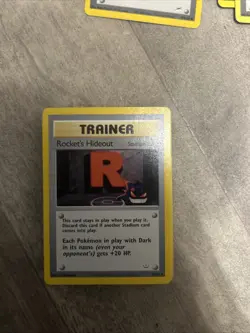 Rocket's Hideout Pokemon Card 63/64 Neo Revelation Set September 2001 NM - Image 1