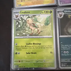 Pokemon Prismatic Evolutions Costco Mini Tin Cosmo Promos (8) Umbreon Sylveon - Image 4