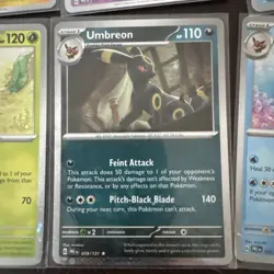 Pokemon Prismatic Evolutions Costco Mini Tin Cosmo Promos (8) Umbreon Sylveon - Image 5