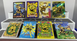 Pokemon Lot of 21 Cards + Stickers All Electabuzz Black Star Movie Promo Slab - Image 4