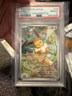2025 POKEMON SVP EN EEVEE PRISMATIC EVOLUTIONS ETB #173 PSA 10 - Image 1