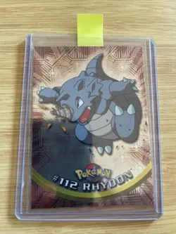 RHYHORN #112 TOPPS BLUE LOGO POKEMON CARD, VINTAGE 1999, NM TV ANIMATION EDITION - Image 1