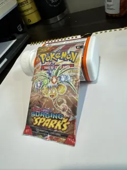 Pokemon TCG Surging Sparks Booster Pack Single Sealed - Image 1