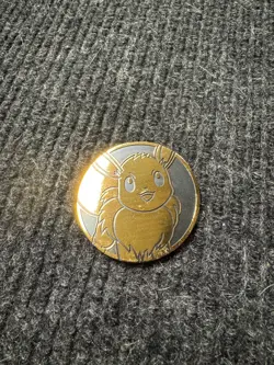 Pokemon TCG Flip Coin Eevee Prismatic Evolutions - Image 1