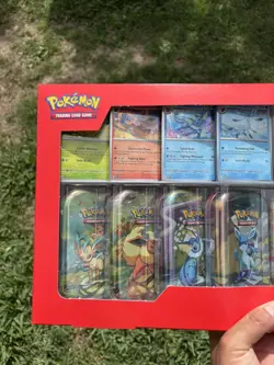 Pokemon TCG: Scarlet & Violet Prismatic Evolutions 8 Pack Mini Tin Set (Costco) - Image 2