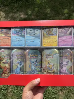 Pokemon TCG: Scarlet & Violet Prismatic Evolutions 8 Pack Mini Tin Set (Costco) - Image 3
