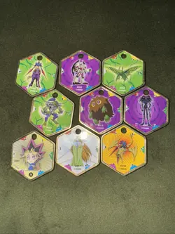 Yu-Gi-Oh! Vintage Takahashi Metal Medallions Hexors Coins Tags Lot of 9 coins - Image 1