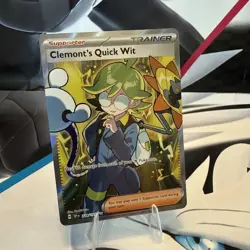 Pokemon Clemont's Quick Wit Holo Ultra Rare Card 229/191 Sv08: Surging Sparks - Image 1